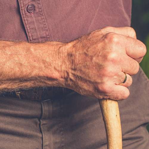 man with stick