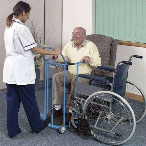 carer helping man stand up