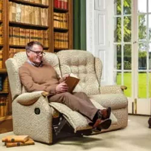 man in rise recliner chair