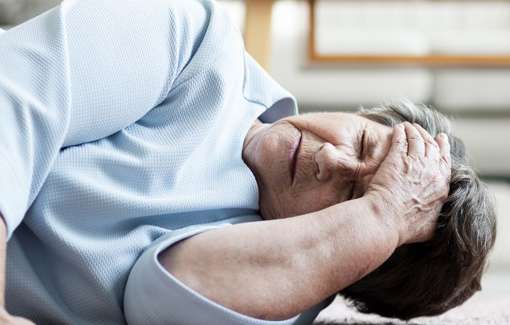 Elderly woman who has fallen to the ground.