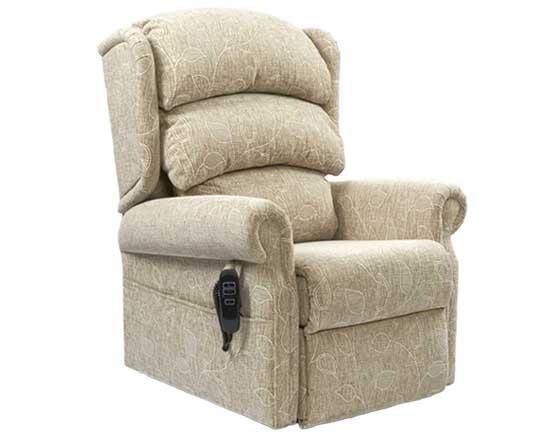 Lifestyle shot of the Brecon electric riser recliner armchair for elderly patients.