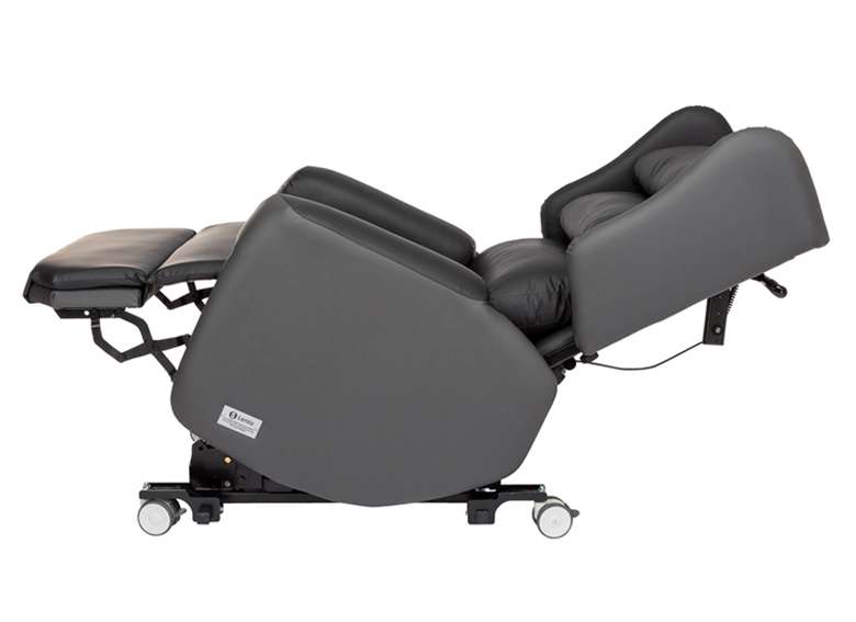 Leno medical grade portable riser recliner chair. The chair is fully reclined with footrest positioned outwards.