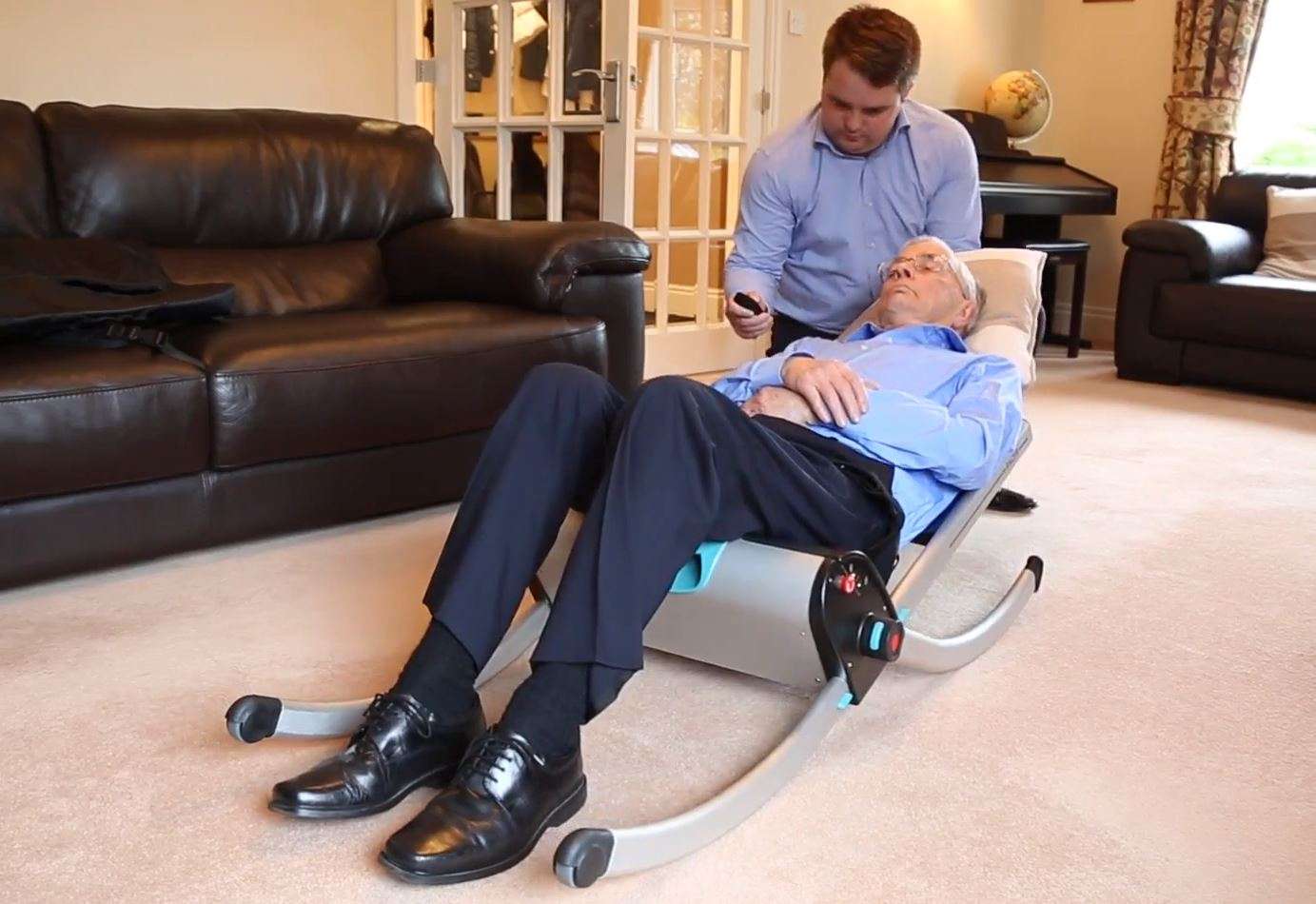 A Raizer emergency lifting chair lifting a fallen person back up to a standing position