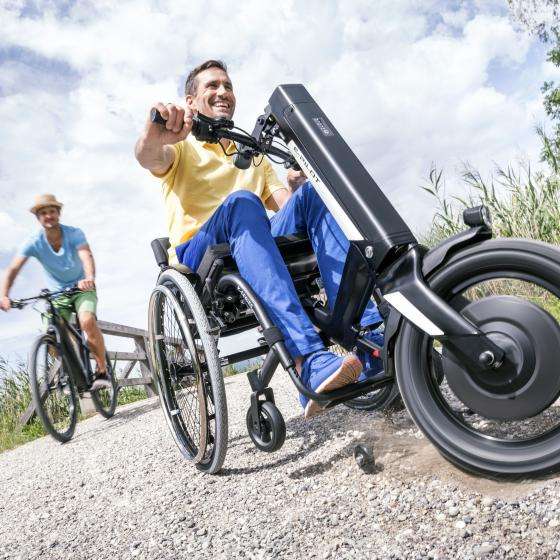 E-pilot hand cycle for active user wheelchairs