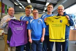Yorkshire Care Equipment staff presenting the new kit to Harrogate Gateway players