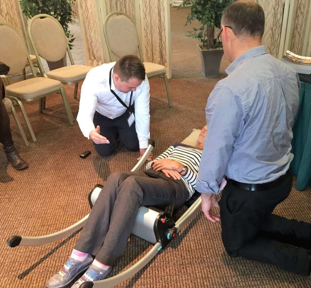 Yorkshire Care staff giving training on the Raizer lifting chair at a free annual event they put on.