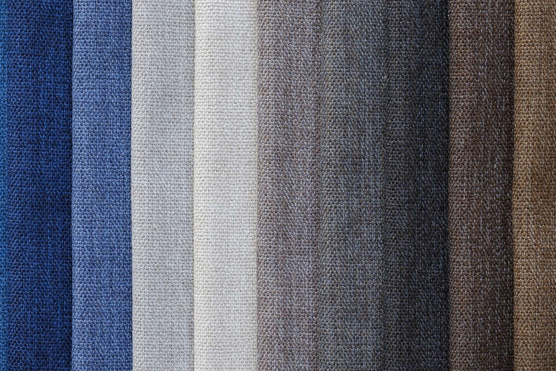 Several different fabrics layered over each other varying in colour.