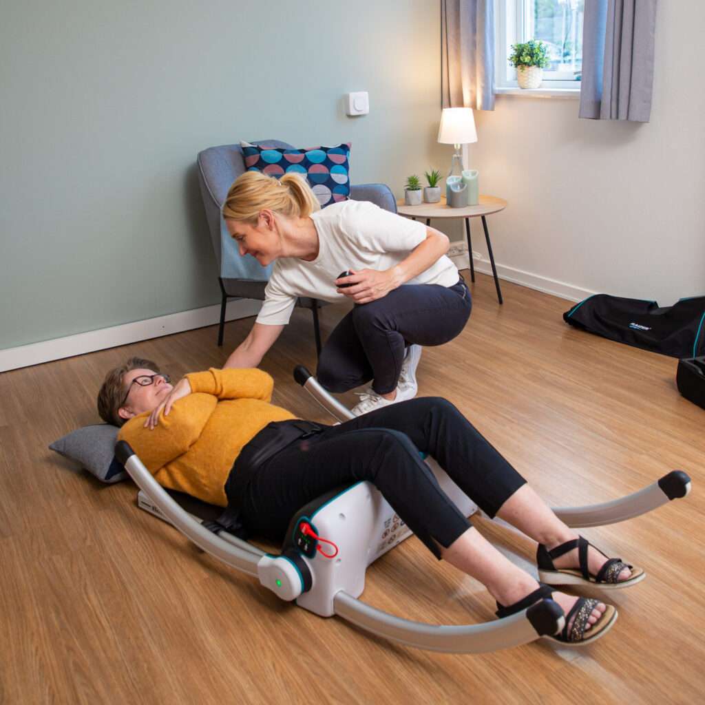 Image showing someone being lifted with the Raizer 2 with their legs out of the way and their arms folded