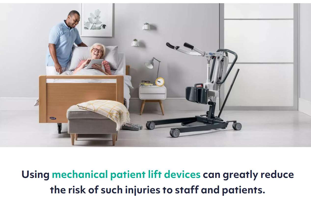 An elderly woman is in bed with a male nurse tending to her bedside. There The picture is indoors and there is a mechanical/electric patient lifting device in the foreground.