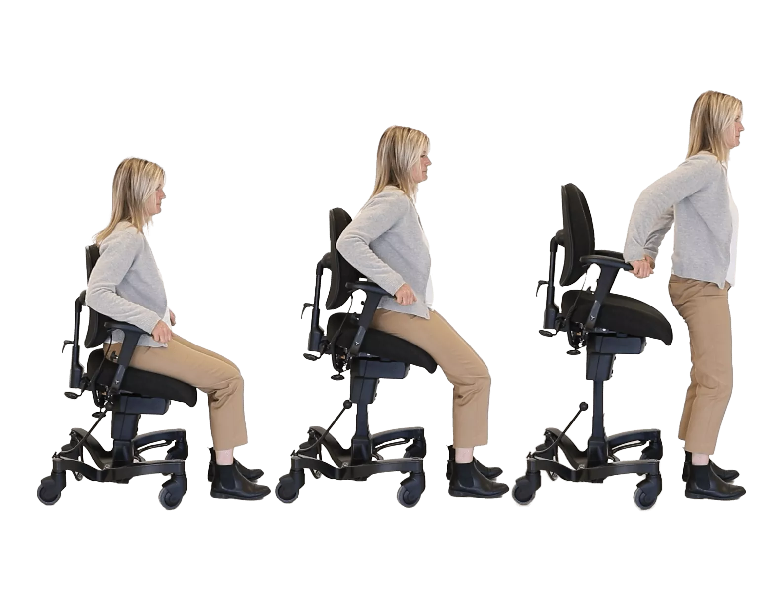 Woman performing a sit to stand motion with the VELA 700e mobility chair for elderly and disabled users.
