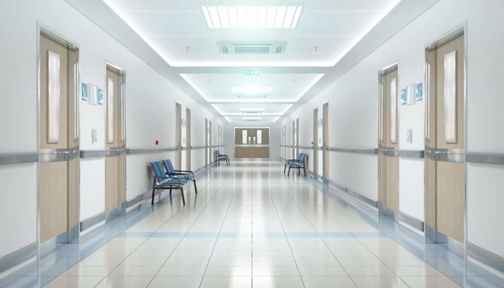 Long hospital bright corridor with rooms and blue seats 3D rendering