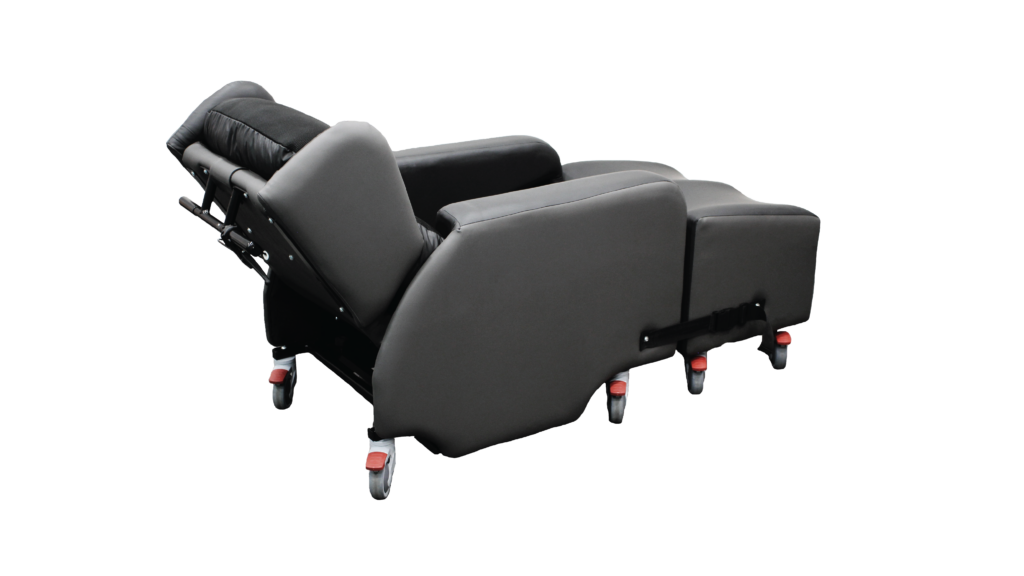Product shot of the Lento Neuro disability recliner chair with wheels. Full product shot taken from the back at a 30° angle.