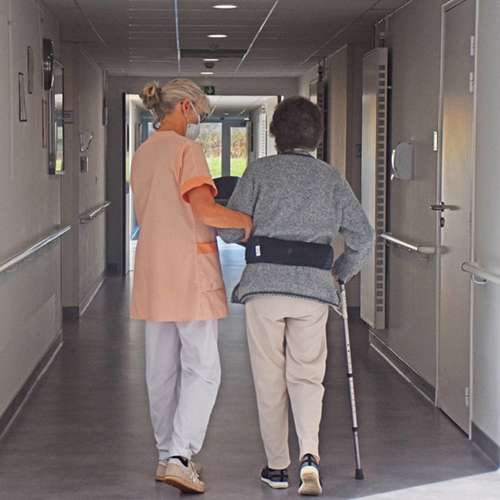 nurse walking patient