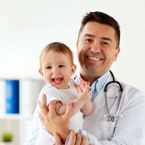 doctor holding baby