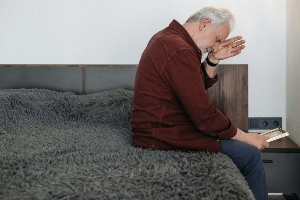 elderly person in pain 